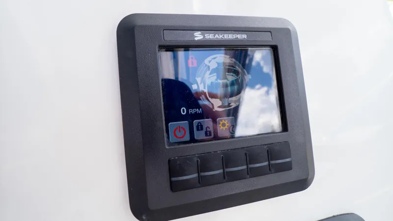 Slide: The Image of Seakeeper control panel on 2018 Intrepid 430 Sport Yacht, displaying RPM and settings. - 14