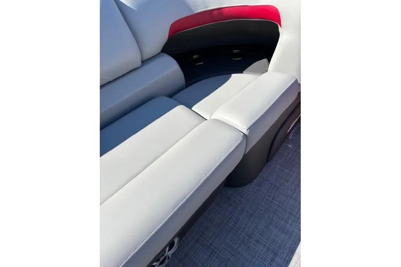 Slide: The Image of 2026 Sun Tracker Party Barge 22 RF DLX boat seating with cup holders and stylish upholstery. - 10