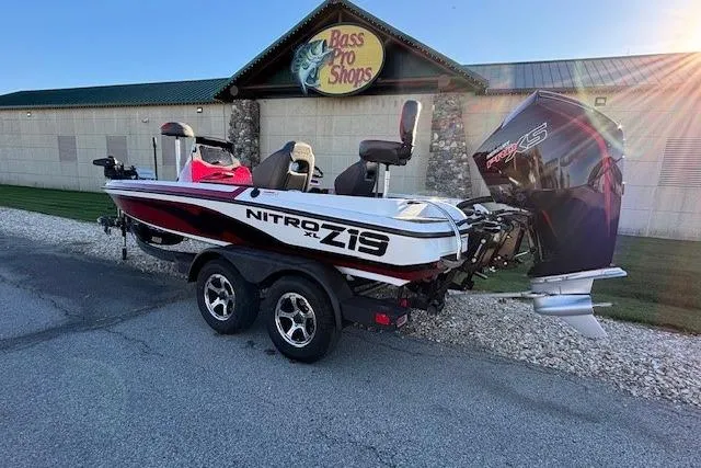 The Image of 2026 Nitro Z19 XL Pro boat on trailer outside Bass Pro Shops. - 0