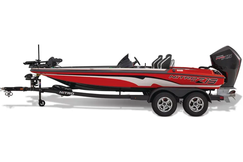 Slide: The Image of 2026 Nitro Z19 XL Pro boat with powerful 200 Pro V8 engine, parked on gravel. - 5