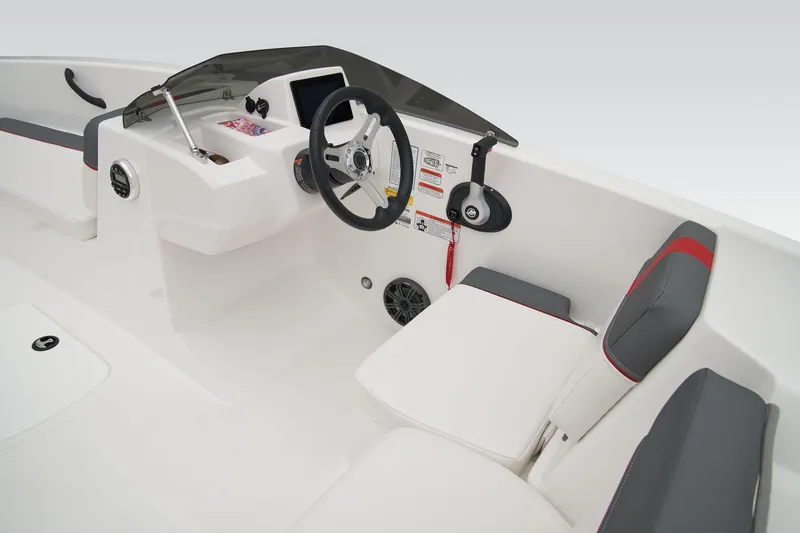 Slide: The Image of 2026 Tahoe T18 boat cockpit with steering wheel and control panel. - 14