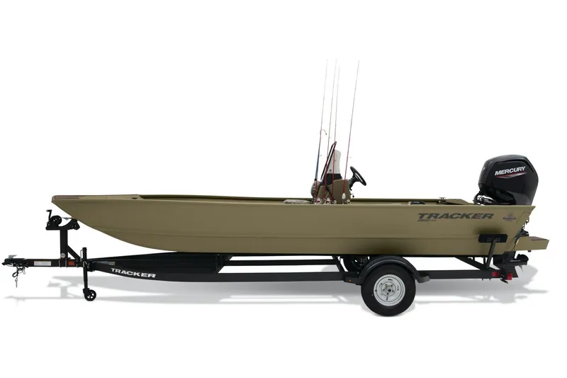 Slide: The Image of 2026 Tracker Grizzly 2072 CC boat on trailer outside dealership. - 2