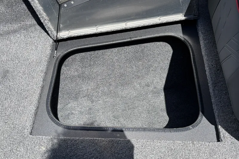 Slide: The Image of Open storage compartment in 2026 Tracker Pro Guide V-175 WT boat. - 37