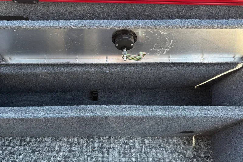 Slide: The Image of Interior view of 2026 Tracker Pro Guide V-175 WT boat storage compartment. - 32