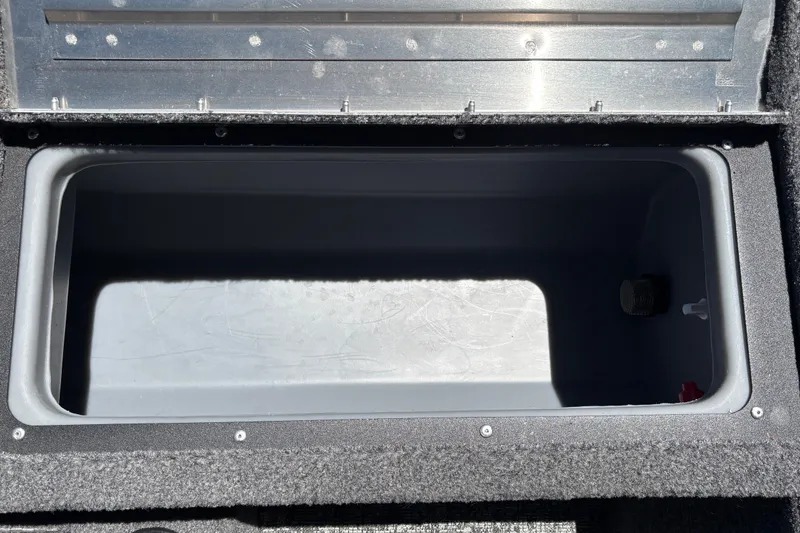 Slide: The Image of Open storage compartment in 2026 Tracker Pro Guide V-175 WT boat. - 25