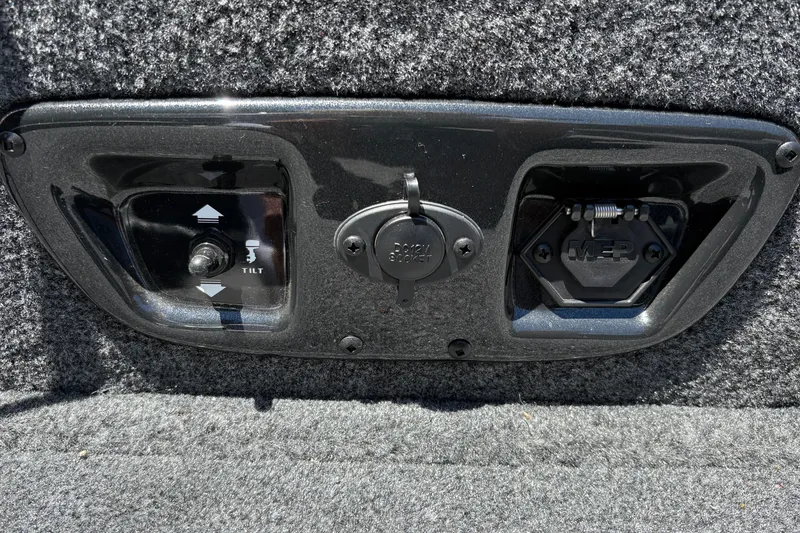 Slide: The Image of Control panel of 2026 Tracker Pro Guide V-175 WT boat with tilt switch and 12V socket. - 40