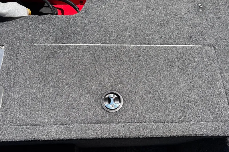 Slide: The Image of Carpeted storage compartment on 2026 Tracker Pro Guide V-175 WT boat deck. - 45