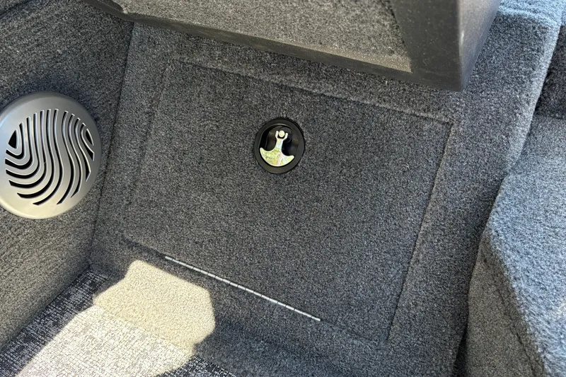 Slide: The Image of 2026 Tracker Pro Guide V-175 WT interior with speaker and storage compartment. - 38