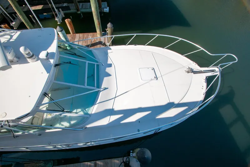 Slide: The Image of 2004 Cabo 40 Express with Seakeeper, docked, aerial view of bow and cabin. - 8