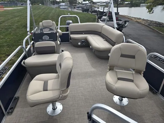 Slide: The Image of 2025 Sun Tracker Bass Buggy 16 XL Select pontoon boat with spacious seating and modern design. - 11