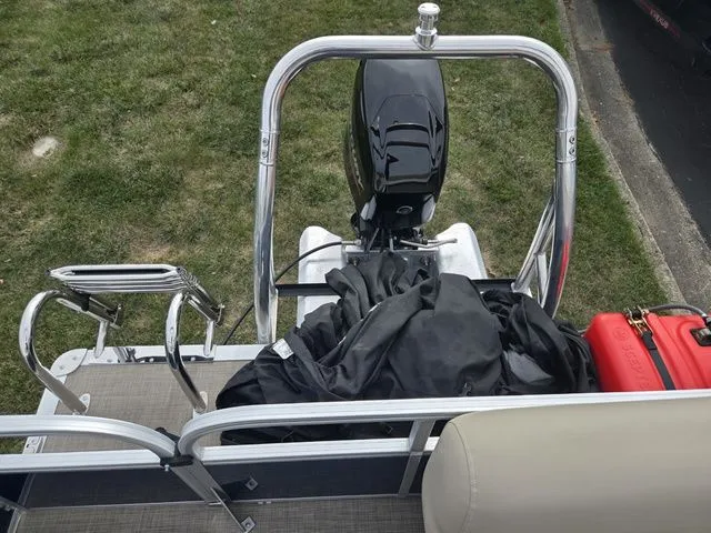 Slide: The Image of 2025 Sun Tracker Bass Buggy 16 XL Select pontoon boat with motor and accessories. - 18