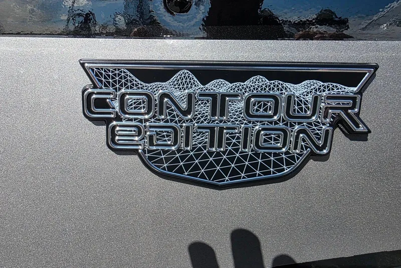 Slide: The Image of "Contour Edition" badge on 2026 Smoker Craft Adventurer 178 DC boat. - 11