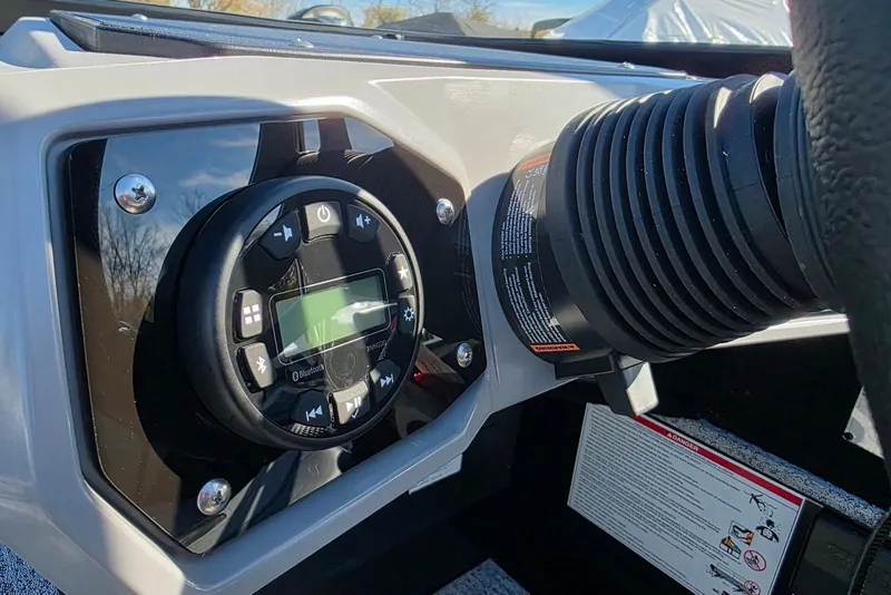 Slide: The Image of 2026 Smoker Craft Adventurer 178 DC dashboard with control panel and steering details. - 19