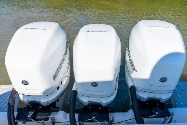 Slide: The Image of Triple Mercury outboard engines on a 2023 Intrepid 438 Evolution boat. - 17
