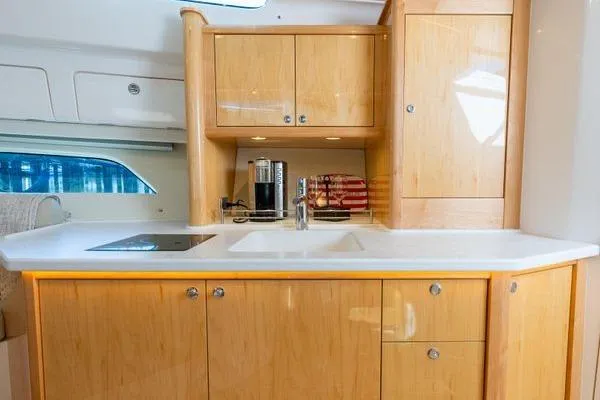 Slide: The Image of Luxurious kitchen interior of 2023 Intrepid 438 Evolution yacht with modern amenities. - 38