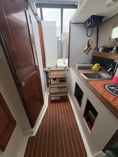 Slide: The Image of Interior of a 1986 Luhrs Alura yacht with kitchen. - 5