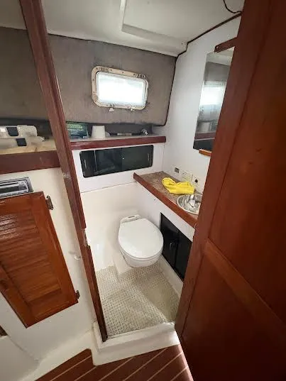 Slide: The Image of Interior view of 1986 Luhrs Alura yacht bathroom. - 6