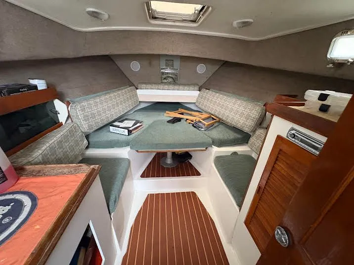 Slide: The Image of Interior of a 1986 Luhrs Alura yacht with seating area. - 7
