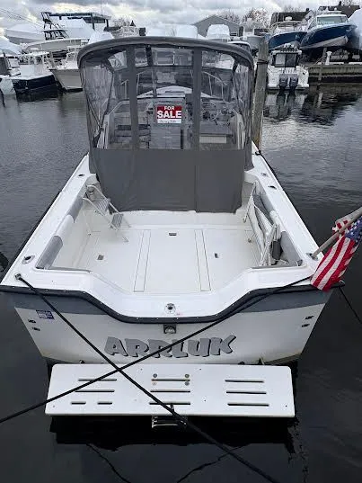 Slide: The Image of 1986 Luhrs Alura boat for sale in harbor. - 9