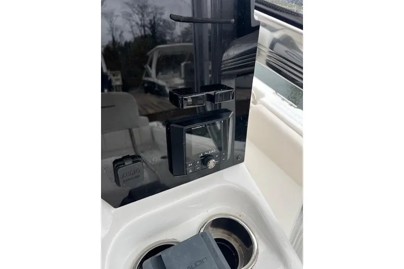 Slide: The Image of JL Audio system on 2018 Sea Hunt Ultra 211 boat dashboard. - 7