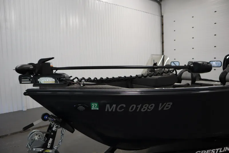 Slide: The Image of 2024 Crestliner 1750 Hawk boat with Minn Kota PowerDrive trolling motor. - 11