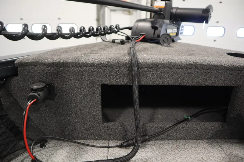 Slide: The Image of 2024 Crestliner 1750 Hawk boat interior with wiring and equipment setup. - 14