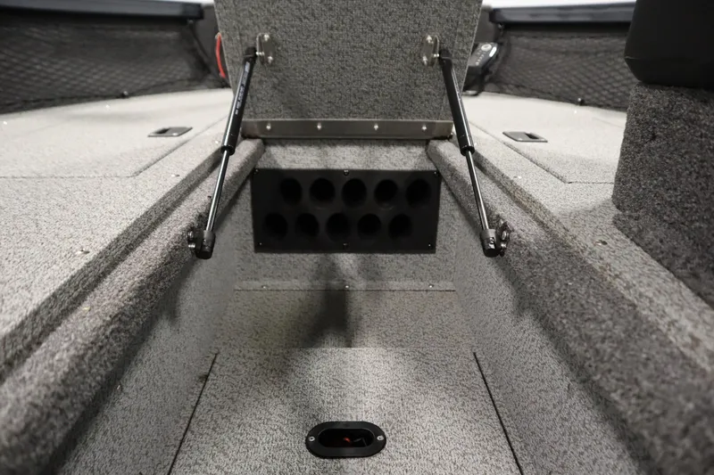 Slide: The Image of 2024 Crestliner 1750 Hawk interior storage compartment with hydraulic lift supports. - 20