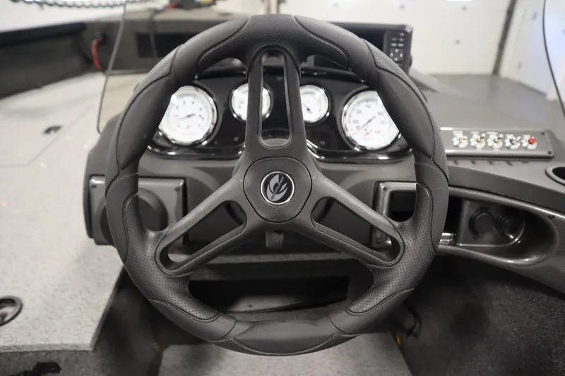 Slide: The Image of 2024 Crestliner 1750 Hawk steering wheel and dashboard close-up. - 24
