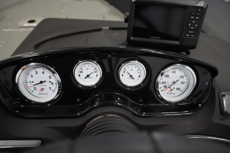 Slide: The Image of Dashboard of 2024 Crestliner 1750 Hawk with gauges and Garmin device. - 26