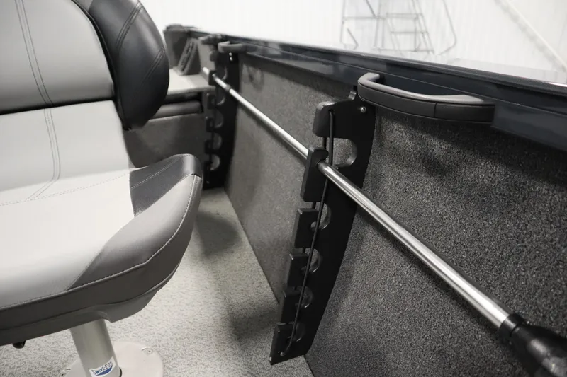 Slide: The Image of 2024 Crestliner 1750 Hawk interior with rod holder and seating detail. - 35
