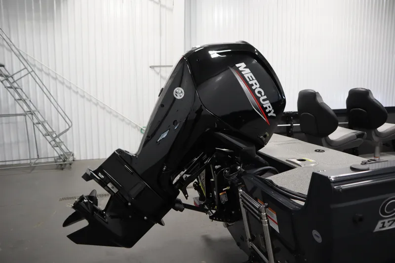 Slide: The Image of 2024 Crestliner 1750 Hawk boat with Mercury outboard motor in a showroom. - 40