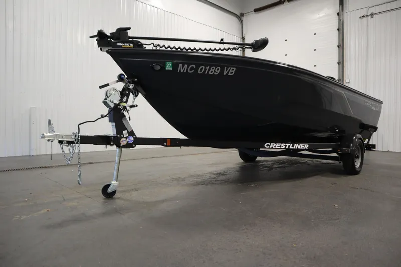 Slide: The Image of 2024 Crestliner 1750 Hawk boat on trailer in indoor setting. - 45