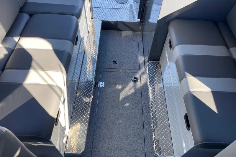 Slide: The Image of Interior seating of 2026 Hewescraft 250 Alaskan ET HT boat with diamond plate flooring. - 31