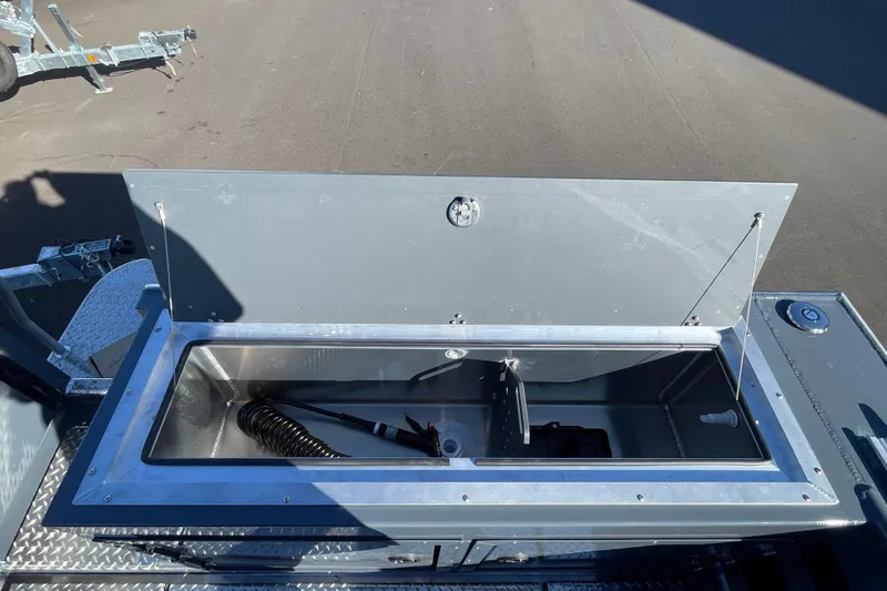 Slide: The Image of Open storage compartment on 2026 Hewescraft 250 Alaskan ET HT boat. - 5