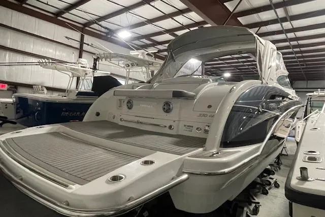 Slide: The Image of 2017 Formula 350 Crossover Bowrider in a storage facility, rear view. - 11