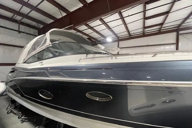 Slide: The Image of 2017 Formula 350 Crossover Bowrider in storage, showcasing sleek design and modern features. - 17