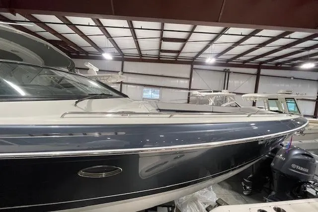 Slide: The Image of 2017 Formula 350 Crossover Bowrider in a storage facility, side view. - 19