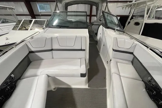 Slide: The Image of 2017 Formula 350 Crossover Bowrider interior with white seating and modern design. - 28