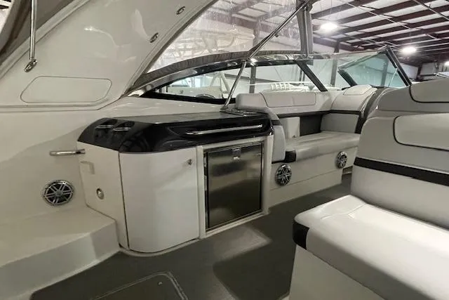 Slide: The Image of 2017 Formula 350 Crossover Bowrider interior with seating and built-in amenities. - 38