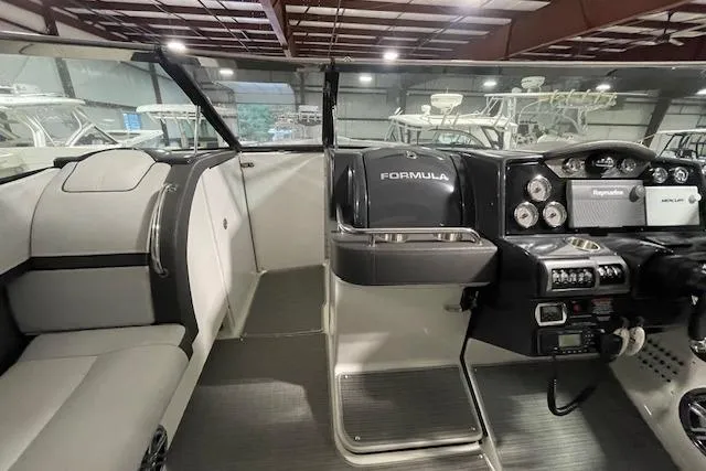 Slide: The Image of 2017 Formula 350 Crossover Bowrider cockpit with modern controls and seating. - 41