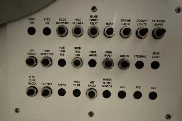 Slide: The Image of Control panel of a 2017 Formula 350 Crossover Bowrider with labeled switches and indicators. - 42
