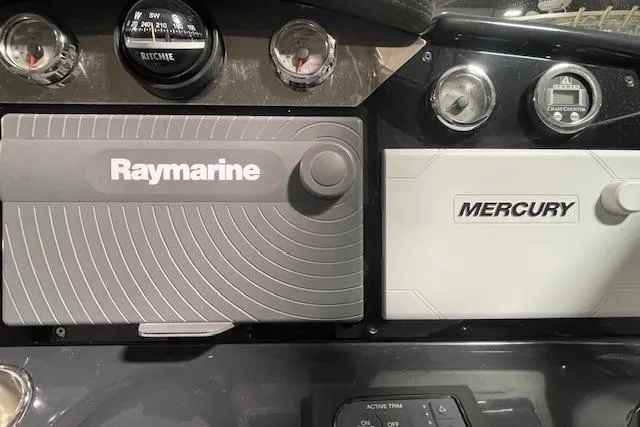 Slide: The Image of Dashboard of 2017 Formula 350 Crossover Bowrider with Raymarine and Mercury controls. - 48
