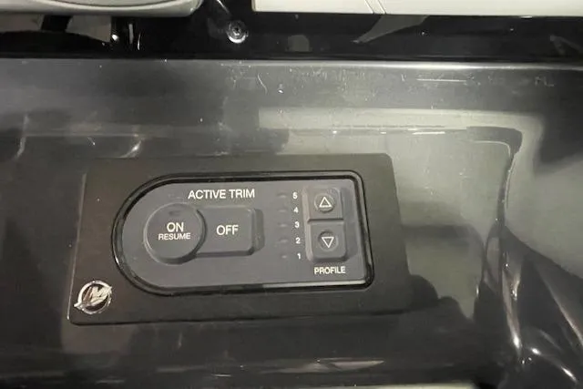 Slide: The Image of Active trim control panel on 2017 Formula 350 Crossover Bowrider boat dashboard. - 49