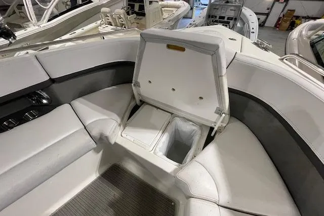 Slide: The Image of 2017 Formula 350 Crossover Bowrider interior with open storage compartment. - 53