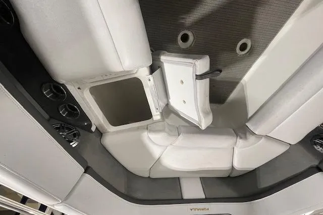 Slide: The Image of 2017 Formula 350 Crossover Bowrider interior seating with storage compartment. - 55