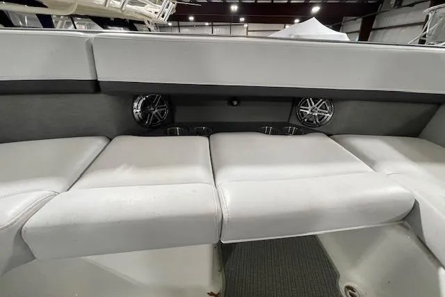 Slide: The Image of 2017 Formula 350 Crossover Bowrider interior seating with speakers and cup holders. - 56