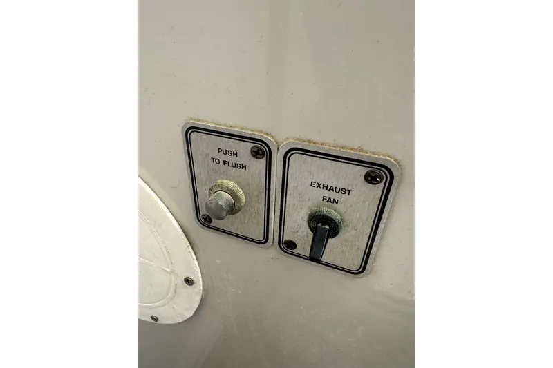 Slide: The Image of Engine room of 1986 Carver 42 Aft Cabin Motor Yacht with blue engines and equipment. - 113