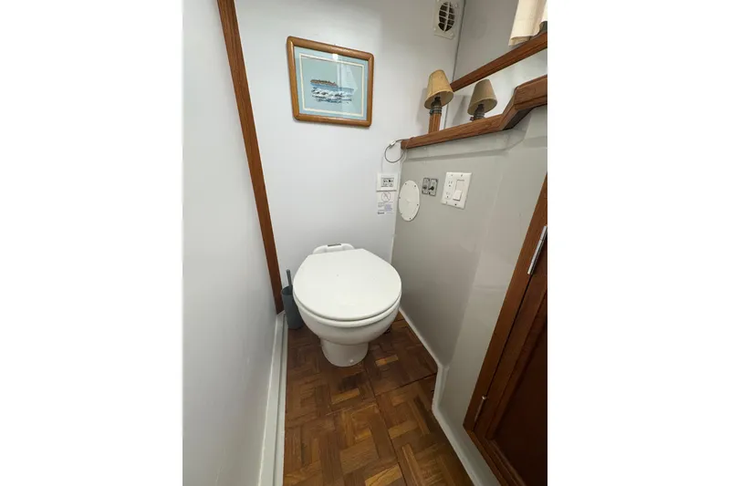 Slide: The Image of Engine room of 1986 Carver 42 Aft Cabin Motor Yacht with Kohler generator. - 115