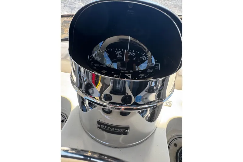 Slide: The Image of 1986 Carver 42 Aft Cabin Motor Yacht bow with anchor winch and railing. - 15