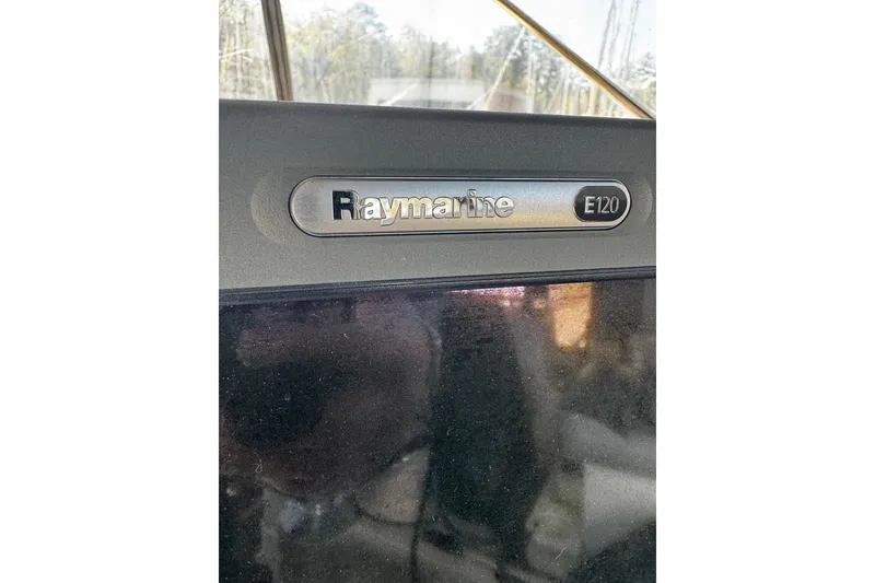 Slide: The Image of Garmin GPSMAP 547 on 1986 Carver 42 Aft Cabin Motor Yacht dashboard. - 32